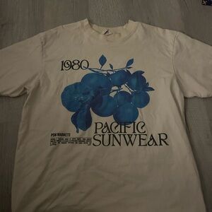 Pacific Sunwear Beige Tee with Blue Floral Design